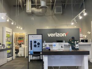 Campbell, California Verizon store interior as Verizon representative helps a customer 